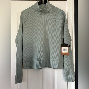 The North Face long-sleeve shirt.